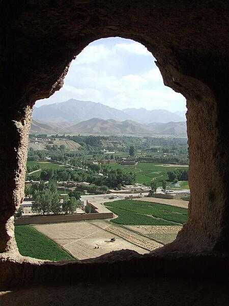 View of surrounding farmlands from within the caves at the &quot;Large Buddha&quot; in Bamyan. The caves were once inhabited by Buddhist monks who left behind a legacy of religious frescoes and paintings, partially destroyed by the fundamentalist Taliban.