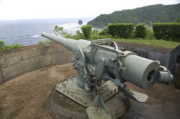 The tensions of World War II prompted the US Government to begin fortifying American Samoa in 1940. US Marines installed the two 5 inch coast defense guns on the west side of Pago Pago Harbor at Blunts Point, and another two on the east side of the harbor at Breakers Point. Following the Japanese attack on Pearl Harbor in December 1941 and the capture of Guam shortly thereafter, American Samoa became of critical importance as the only major American base in the western Pacific, and it was further fortified in anticipation of attack. Although no attack ever came, American Samoa was a critical supply and training point for American military actions in the Pacific. Photo courtesy of the US National Park Service.