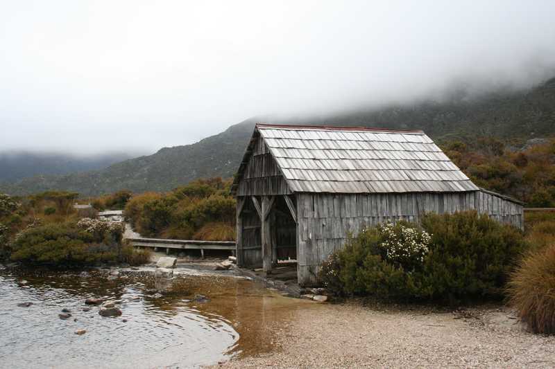 Dove Lake, tucked below Cradle Mountain Park in Tasmania, is a popular recreation area for tourists and locals. This old boathouse, long since abandoned, provides a picturesque setting on a typical Tasmanian rainy day.
