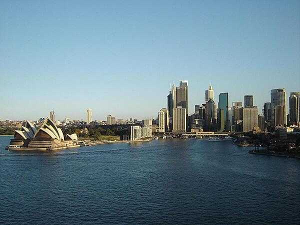 View of Sydney&apos;s Harbor and skyline, including the famous Opera House.