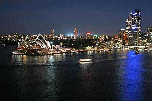 Night at Circular Quay in Sydney. View includes the Central Business District, Circular Quay, and the Sydney Opera House.