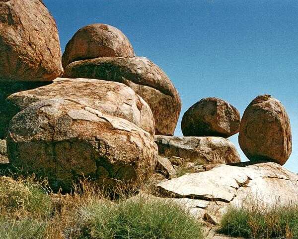 Some of the granite boulders at Devils Marbles Conservation Reserve near Wauchope, in the Northern Territory. The marbles were formed through various geological processes including chemical and mechanical weathering.