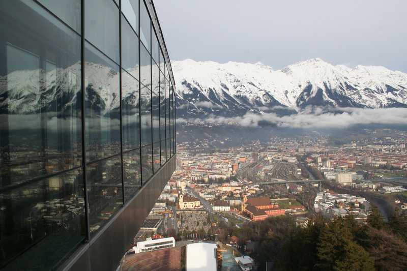 View from the top of the Olympic Ski Jump showing part of Innsbruck and the surrounding mountains. Innsbruck has twice hosted the Winter Olympics, in 1964 and 1976.
