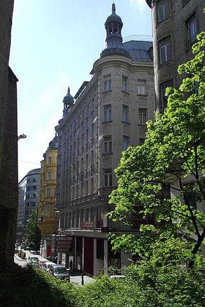 A harmonious blend of 19th and 20th century architecture on a side street in Vienna.