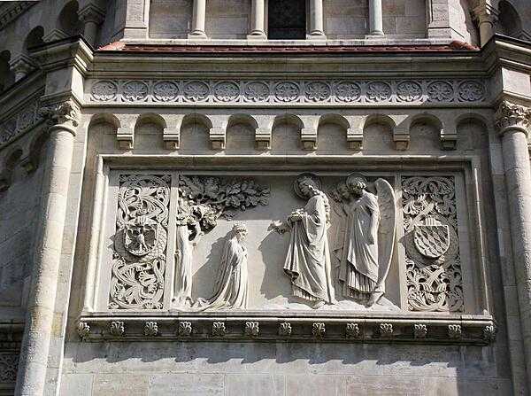 A high relief carving on the exterior of the Church of St. Francis of Assisi (the Jubilee Church) in Vienna.