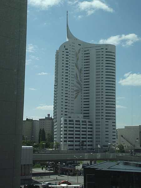 This distinctive building is the Hochhaus Neue Donau (High Rise New Danube), the tallest residential building in Austria.