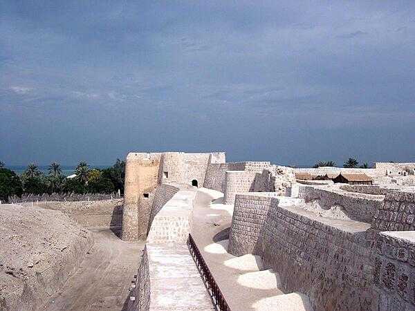 Walls of the historic Qal&apos;at al-Bahrain (Fortress of Bahrain), which is the largest and most ancient historical site in the country. It was an important center of the Dilmun Civilization (2nd and 1st millennia B.C.); in later periods, it served as a trading and military outpost.
