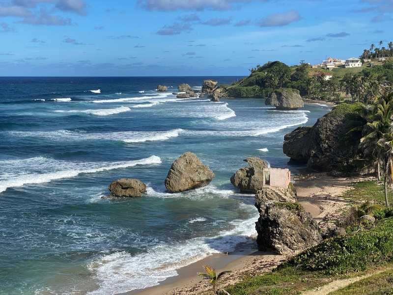 Bathsheba Beach is a popular surfing spot along the rugged east coast. Limestone formations dot the coastline providing a stark contrast to the clear waters.