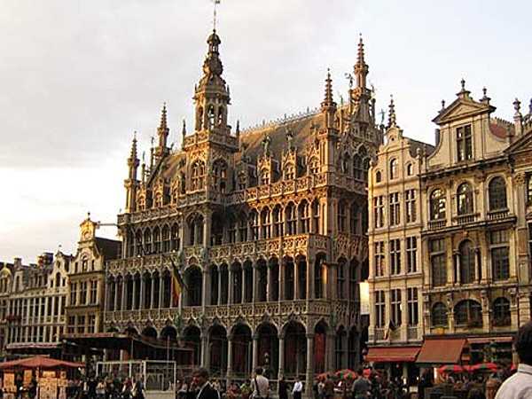 The Maison du Roi (King's House) or Broodhuis (Breadhouse) on the Grand Place/Grote Markt in Brussels houses the Brussels City Museum. The Grand Place (or Grand Square) is the central square of Brussels; it is bounded by opulent guildhalls and two major edifices, the city's Town Hall and the King's House or Breadhouse building. Measuring 68 by 110 m (223 by 361 ft), the Grand Place is the most important tourist destination and most memorable landmark in Brussels. Considered to be one of the most beautiful squares in Europe, it has been a UNESCO World Heritage Site since 1998.