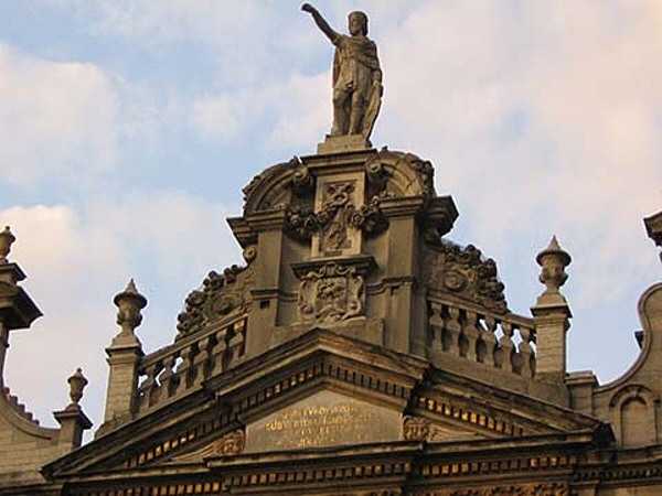 A statue of Saint Homobonus of Cremona, patron saint of tailors, caps the House of the Corporation of Tailors in the Grand Place/Grote Markt in Brussels. The house is also referred to as La Chaloupe d'Or/De Gulden Boot (The Golden Boat).