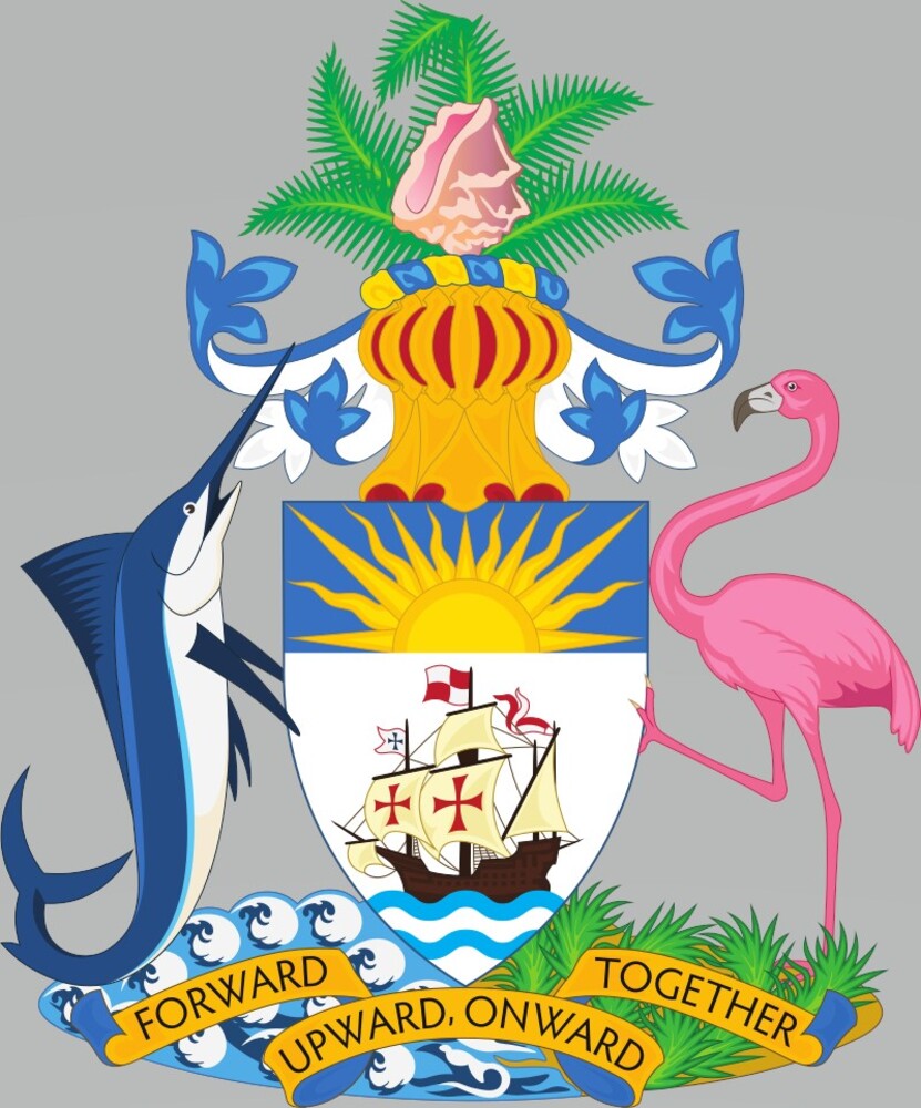 The motto on the Bahamas coat of arms is “Forward, Upward, Onward Together.”  The rest of the coat of arms shows several items indigenous to the country: The flamingo and marlin supporting the shield are the national animals that represent respectively the land and sea; the pink conch shell symbolizes the marine life of the islands; and the green palm fronds represent the natural vegetation. The Santa Maria, Christopher Columbus’s flagship, also appears on the shield, and the sun signifies the world-famous resort climate and the bright future of the islands.