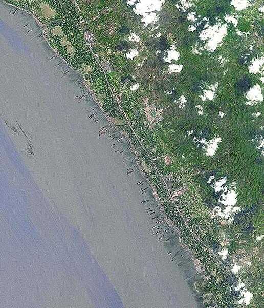 This image from NASA Terra spacecraft shows the Bangladeshi coast north of Chittagong, where ships from around the world are beached and dismantled. Image courtesy of NASA.