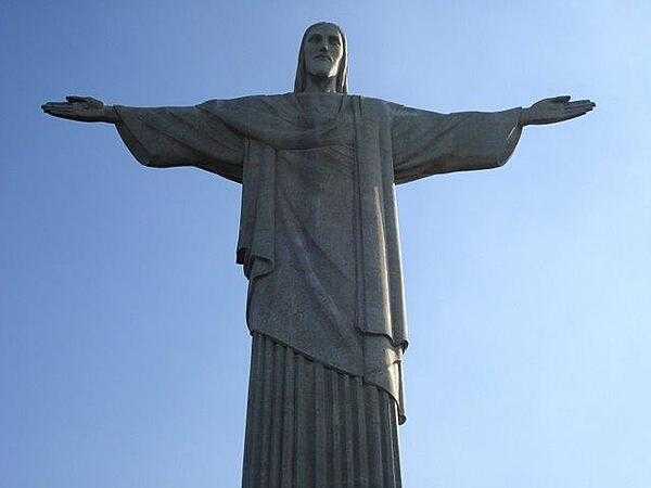 Close-up of the O Cristo Redentor (Christ the Redeemer) statue overlooking Rio de Janeiro.