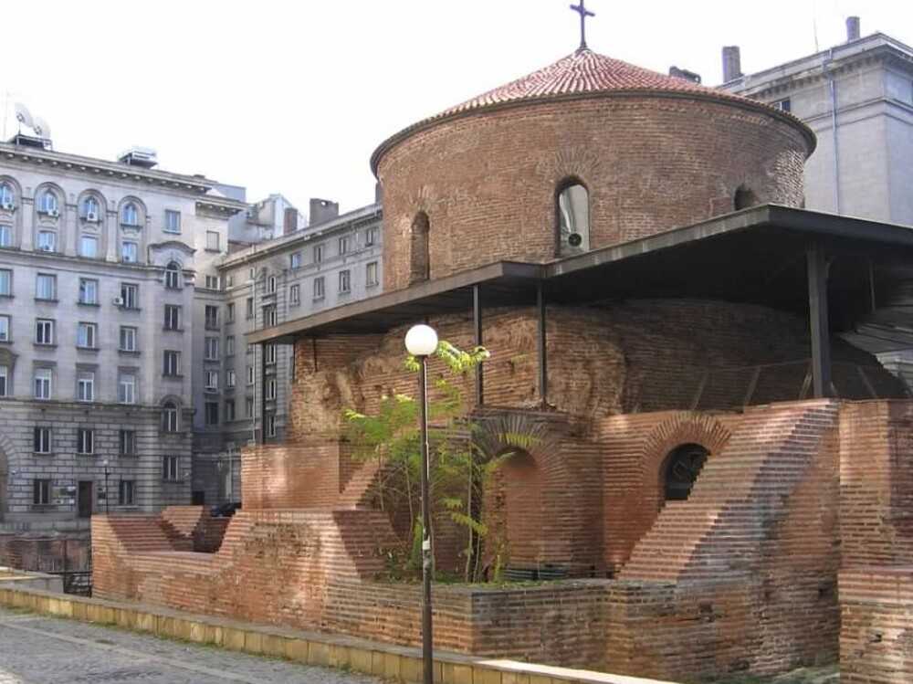 The Church of Saint George in Sofia, Bulgaria, is the oldest building in the capital city.  Built as baths by the Romans in the early fourth century, it became a church inside the walls of Serdica, the capital of Dacia Mediterranea during the Roman and Byzantine Empires. During the 16th century Ottoman invasion, the church was turned into a mosque. At the end of the Ottoman empire, it became part of the Bulgarian Orthodox Church.