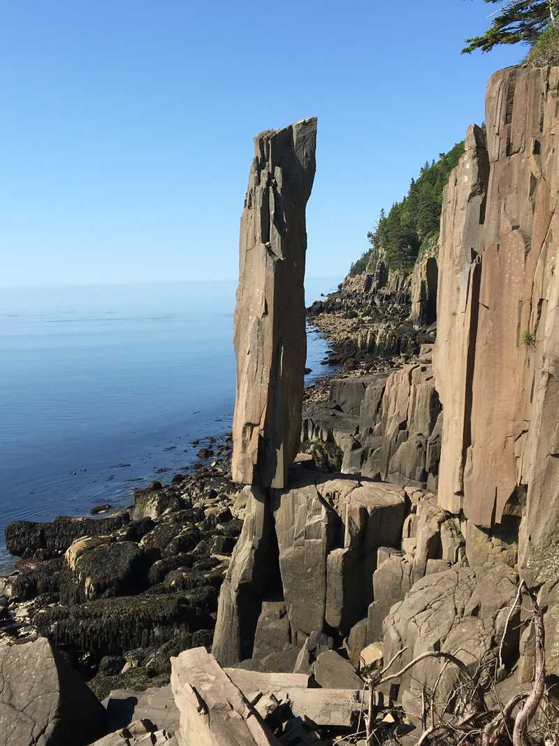 Balancing Rock is a 20 foot tall basalt pillar located along St. Mary’s Bay in Nova Scotia. This rock sits precariously along the exposed coastline and is strong enough to have resisted previous efforts by boats to pull it down.
