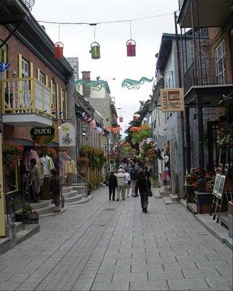 Shopping along one of Quebec City&apos;s narrow streets.