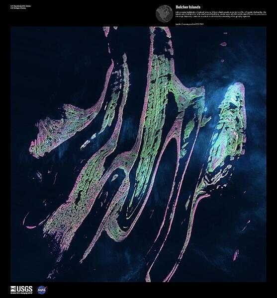 Like sweeping brushstrokes of pink and green, the Belcher Islands meander across the deep blue of the James Bay portion of the Hudson Bay. The islands shown in this enhanced satellite image are part of the Belcher archipelago, which is comprised of approximately 1,500 islands and covers an area of 3,000 sq km (1,160 sq mi). The islands&apos; only inhabitants live in the small town of Sanikiluaq, near the upper end of the middle island. Despite the green hues in this image, these rocky islands are too cold - and the soil is too thin - to sustain more than a smattering of low-growing vegetation. Image courtesy of USGS.