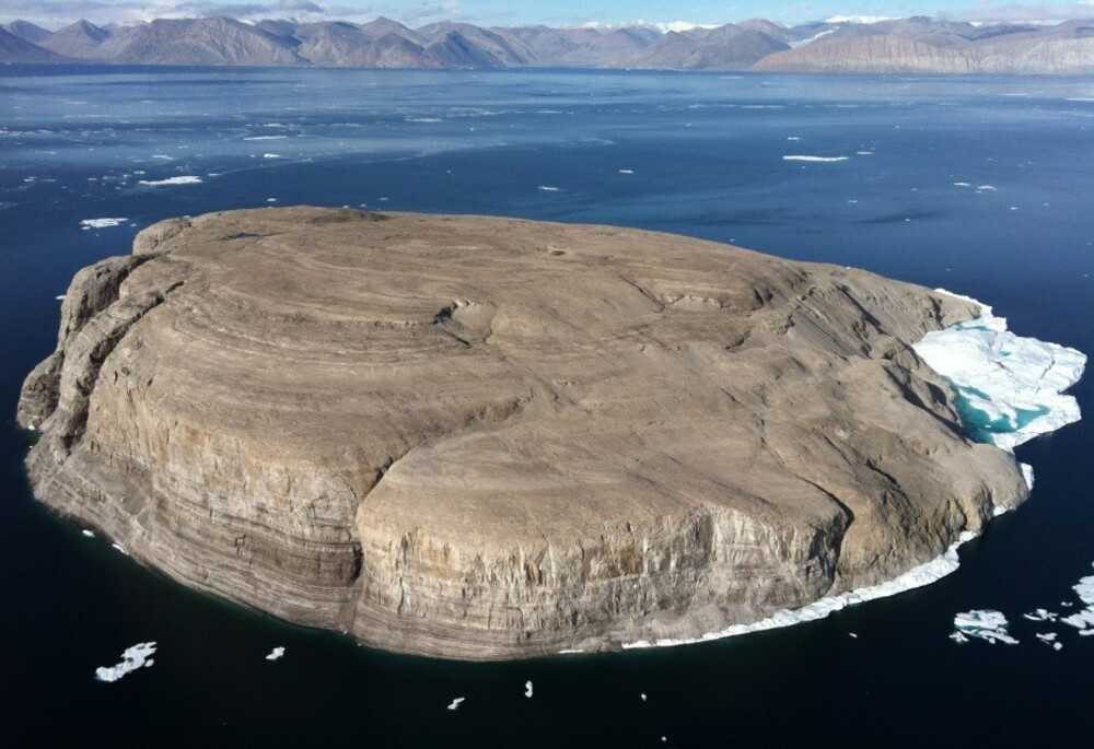 Hans Island, an uninhabited island located between Canada’s Ellesmere Island and Greenland (an autonomous territory of Denmark), was the center of a “whiskey war” between Canada and Denmark from 1984 to 2022. The island was named for Greenlandic Inuk explorer Hans Hendrik, who was part of the 1853 expedition to the barren 130 h (320 acre) island that established Denmark’s claim. Canada then operated a scientific station there during World War II, and a Canadian oil company later operated nearby. In 1984, the Danish prime minister planted a flag on the island, prompting the Canadians to plant their flag – and leave a bottle of whiskey for the Danes. The Danes reciprocated with a flag-raising and a bottle of schnapps for the Canadians. This “war” lasted until an agreement in 2022 split the island in half. The agreement was sealed with a final exchange of spirits.