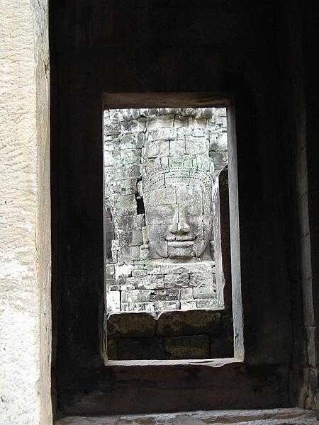 Face framed by windows at the Bayon temple at Angkor Thom.