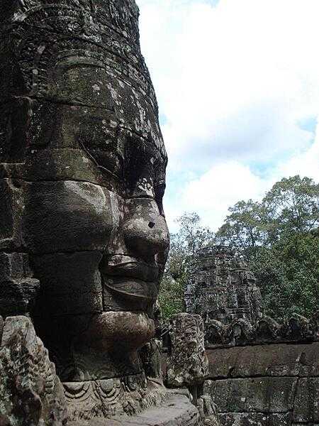Close up of one of the 216 faces at the Bayon temple at Angkor Thom.