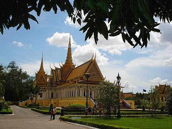The Throne Hall at the Royal Palace grounds in Phnom Penh. Built in 1917, the building was where the king&apos;s confidants, generals, and royal officials once carried out their duties. Today it is used for religious and royal ceremonies, and as a meeting place for guests of the king.