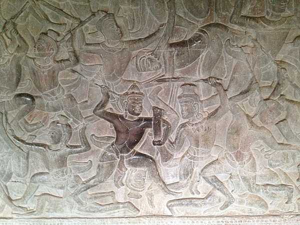 Wall carving showing a battle scene at Angkor Wat.