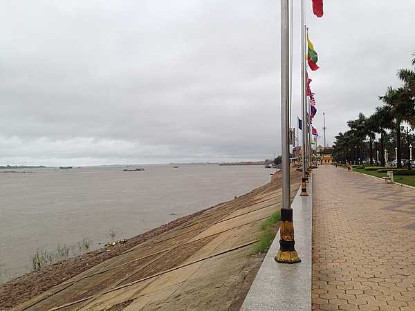 International flags along a Phnom Penh promenade where the Mekong River and Tonle Sap (lake) meet.