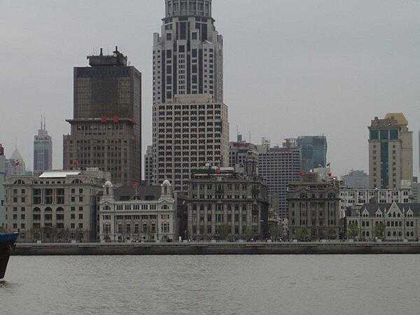 View of The Bund area in Shanghai from across the Huongpu River. &quot;Bund&quot; is an Anglo-Indian word for an embankment of a muddy waterfront.