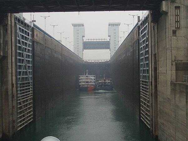 The Gezhouba Dam locks on the Yangtze River. The dam - completed in 1988 - is 38 km downstream (east) of the Three Gorges Dam. Here the water level in the locks has been lowered to receive vessels.