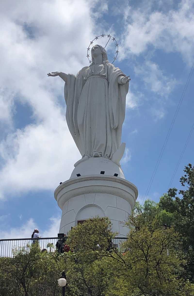 The statue of the Immaculate Conception of the Virgin Mary sits on San Cristobal Hill overlooking the city in the Metropolitan Park. The park includes miles of walking trails, a gondola, and other attractions and is popular with locals on the weekends.