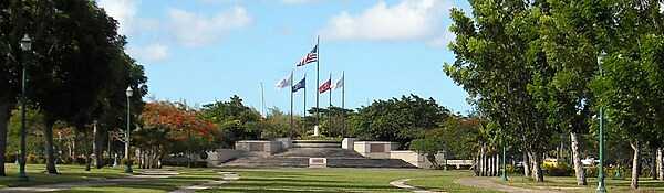 Memorial Court of Honor and Flag Circle at American Memorial Park in Garapan on the island of Saipan. The park honors the American and Marianas people who gave their lives during the Marianas Campaign of World War II. At the park, memorials stand in tribute to the courage and sacrifice of the US Servicemen and Chamorro and Carolinian civilians who were killed in the battles between the United States and Japan that took place on Saipan, Tinian, and the Philippine Sea in 1944. Photo courtesy of the US National Park Service.