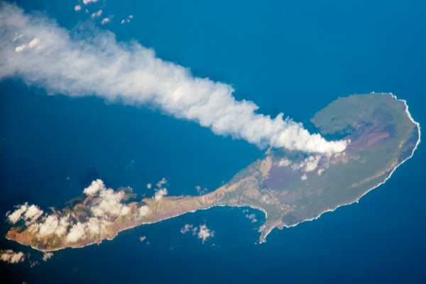 Satellite view of Mount Pagan erupting in 2012. Photo courtesy of NASA.