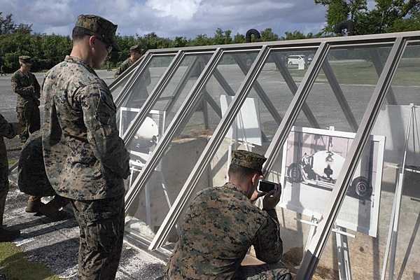 US Marines visit the historically important World War II B-29 base at North Field, Tinian, Commonwealth of the Northern Mariana Islands, on 17 November 2015. During their visit the Marines learned about Operations Silverplate and Centerboard, code names for the nuclear attacks on Hiroshima and Nagasaki. The Marines were able to view the location of the two atomic bomb loading pits necessary to load the oversized nuclear bombs aboard the B-29’s. Photo courtesy of US Marine Corps / Gunnery Sgt. Justin Park.