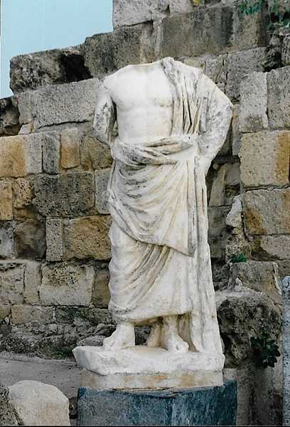 Headless statue of a male notable at the Roman public pool at Salamis.