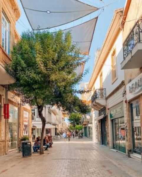 Ledra Street is in the middle of the divided capital city of Nicosia. A busy shopping center, it has figured prominently in its nation’s divided history. At 1 km long, it connects the southern and northern parts of the old city and has been the site of several battles for occupation. Ledra Street hosts part of the buffer zone established along the ceasefire line, separating the northern Turkish controlled part of the island from the south.