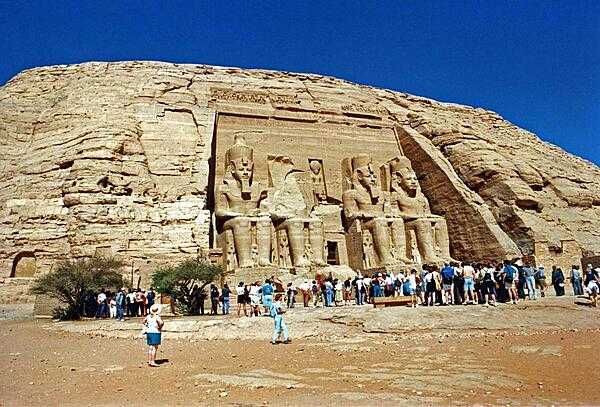 The temples at Abu Simbel were moved to higher ground in the 1960s to save them from the flooding caused by the completion of the Aswan Dam. The carvings on the Great Temple shown here (completed about 1265 B.C.) dwarf mere humans.