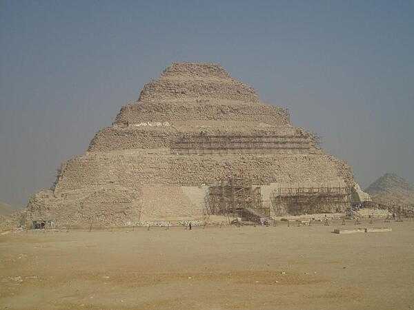 Step Pyramid of Pharaoh Djoser at Saqqara built by the architect Imhotep in the 3rd Dynasty (2649-2575 B.C.). It was the first stone pyramid in the world and was made up of a series of six buildings or mastabas (benches) placed on top of each other.