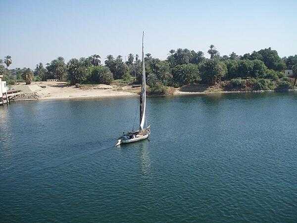 A felucca glides along the Nile River south of Edfu.