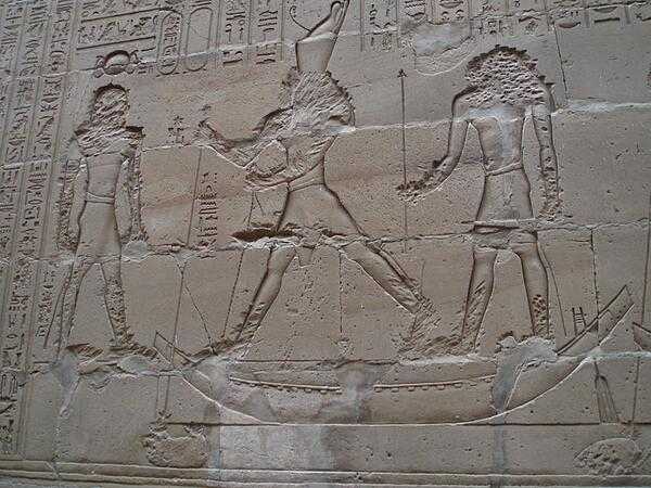 Reliefs showing the god Horus defeating his uncle Seth at the Temple of Horus at Edfu. The reliefs probably were damaged by early Christians to remove faces and hands.