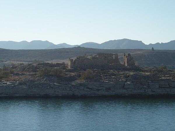 Ruins of a Byzantine church at Kasr Ibrim in Lake Nasser. Kasr Ibrim originally was a major city perched on a cliff above the Nile River but the flooding of Lake Nasser transformed it into an island. Kasr Ibrim was the site of military fortifications from the times of the pharaohs.