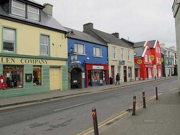 Street view in Dingle, County Kerry. Dingle (An Daingean) is the principal town on the Dingle Peninsula in southwest Ireland. The colorful town and peninsula attract many tourists.