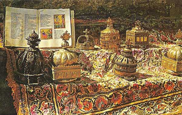 National treasures - reliquaries, crowns, and an ancient velum book - from the Church of Our Lady Mary of Zion in Axum. The church also claims to contain the Ark of the Covenant, but only a single guardian monk, appointed for life, may view and pray before the Ark.
