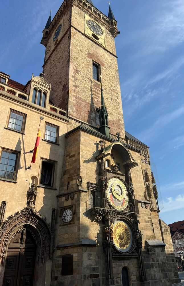 Constructed in 1410, the Prague Orloj is the third-oldest astronomical clock in the world and the oldest clock still in operation. Attached to the town hall in Old Town Prague, Czechia, the clock shows four different times: Babylonian Time, Old Bohemian Time, Central European Time (CET), and Star Time. Babylonian Time, which divides the time between sunrise and sunset, is the earliest form of telling time that is shown on the clock. Old Bohemian Time was used in the Middle Ages, with a day that starts from sunset rather than midnight. Central European Time is the modern format, and Star Time (or Sidereal time) is used by astronomers, with a time scale based on the Earth's rate of rotation relative to fixed stars.