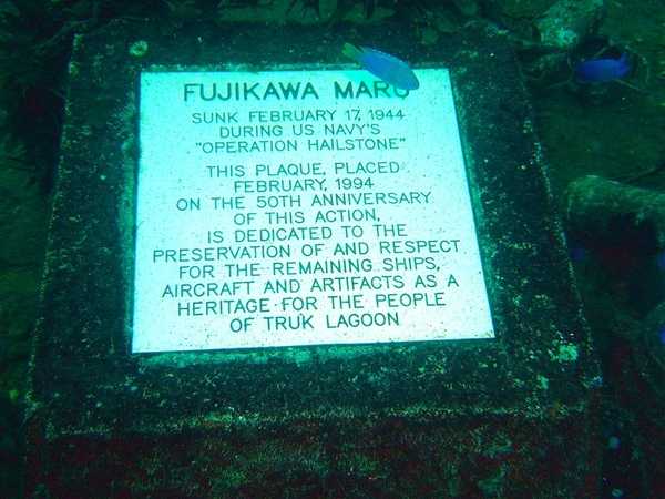 Underwater commemorative plaque in Chuuk (Truk) Lagoon, placed there on the 50th anniversary of the sinking of the Japanese cargo ship, Fujikawa Maru, in February 1944. During World War II, Truk Lagoon was the most important advanced base of the Imperial Japanese Navy. Japan acquired Truk Lagoon following World War I and developed the lagoon as a base throughout the inter-war period. It eventually became the Headquarters for the Japanese Fourth Fleet in 1939 and later the Combined Fleet Base. It was heavily defended with five airfields, communications facilities, repair depots, and storage facilities. It had been described as the "Gibraltar of the Pacific." Beginning in February 1944, the lagoon came under heavy air attack by Allied carrier aircraft and long range land based bombers. The sunken remains of 51 Japanese warships and 39 cargo ships lie in the lagoon, some in fairly shallow water, making it an interesting site for recreational divers. The wrecks are considered war graves. Image courtesy of NOAA / David Burdick.