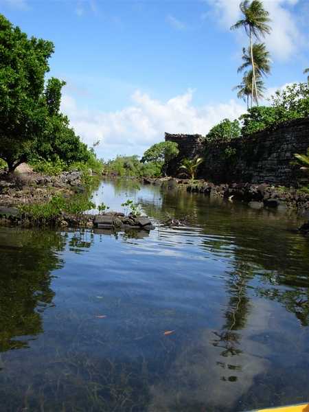 A placid, shallow canal in Nan Madol on Temwen Island. Photo courtesy of NOAA.