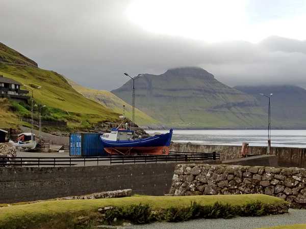Small harbor and mountains in the Faroe Islands.