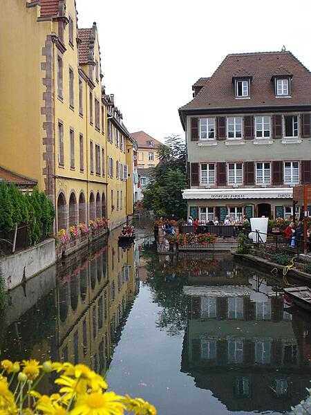 Buildings along a canal in Colmar, an Alsatian town known as &quot;Little Venice.&quot; Situated on the Lauch River, Colmar connects to the Rhine via a canal.