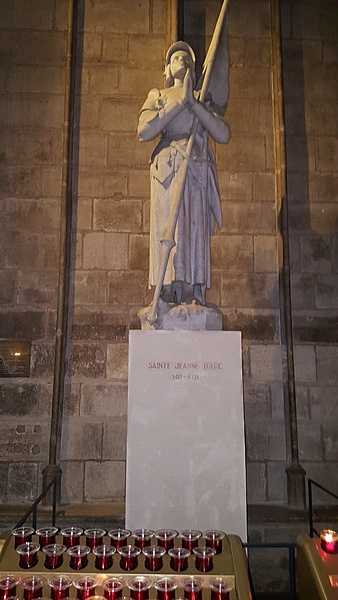 This marble statue of Joan of Arc stands in Notre Dame Cathedral in Paris. The statue dates from 1920-21 and was sculpted by Charles Jean Desvergnes. Canonized in 1920, Joan is one of the patron saints of France.