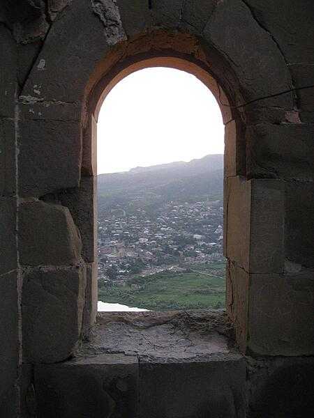 View of Mtskheta through a window opening at the Jvari Monastery (Monastery of the Cross).