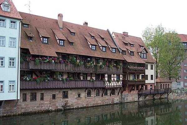 Colorful flower boxes along the Pegnitz River in Nuremberg.